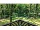 Scenic backyard with mature trees and a tranquil setting at 7016 Valley Dr, Raleigh, NC 27612