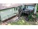 Backyard featuring wooden deck, stairs, and landscaped yard at 7016 Valley Dr, Raleigh, NC 27612