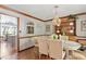 Charming dining room with decorative lighting and vintage-inspired furnishings at 7016 Valley Dr, Raleigh, NC 27612