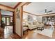 Inviting living room with hardwood floors, neutral furniture, and charming decor at 7016 Valley Dr, Raleigh, NC 27612