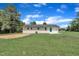 Well-kept backyard with freshly seeded grass at 802 Creech Church Rd, Kenly, NC 27542