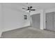 This bedroom has a large ceiling fan, a window and a large closet at 802 Creech Church Rd, Kenly, NC 27542