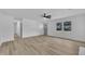 Bright living room with a large window and neutral tones exudes simple elegance at 802 Creech Church Rd, Kenly, NC 27542