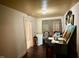 Formal dining room with hardwood floors, and minimal decorations at 981 Leasburg Rd, Roxboro, NC 27573