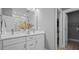 Modern bathroom with double vanity, white countertops, and sleek fixtures at 1101 Shovelhead Dr # 51, Durham, NC 27703