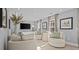 Cozy living room featuring plush seating, large windows, and neutral colors at 1101 Shovelhead Dr # 51, Durham, NC 27703