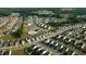 Wide aerial view of a large, planned residential community with lush greenery at 1108 Matterhorn Dr, Fuquay Varina, NC 27526