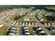 Expansive aerial view of a residential community with a pool and recreational area at 1108 Matterhorn Dr, Fuquay Varina, NC 27526