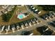 Aerial view of community amenities including a swimming pool and playground at 1108 Matterhorn Dr, Fuquay Varina, NC 27526