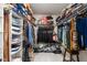 Walk-in closet with organized shelving and hanging storage for clothing and accessories at 1154 Yorkshire Dr, Burlington, NC 27215