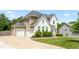 Spacious home with an attached two-car garage, well-maintained lawn, and inviting curb appeal at 1154 Yorkshire Dr, Burlington, NC 27215