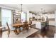 Open concept kitchen and dining area with granite counters and stainless appliances at 1154 Yorkshire Dr, Burlington, NC 27215