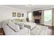 Spacious living room features a stone fireplace, plush seating, and natural light at 1154 Yorkshire Dr, Burlington, NC 27215