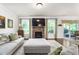Inviting living room with a fireplace, comfortable seating, and views of the outdoors at 1154 Yorkshire Dr, Burlington, NC 27215