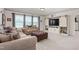Inviting living room featuring comfortable seating and a custom entertainment center with storage at 1154 Yorkshire Dr, Burlington, NC 27215