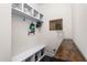Mudroom with bench, storage cubbies, hooks, and wood countertop at 1154 Yorkshire Dr, Burlington, NC 27215