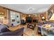 Inviting living room featuring a fireplace, plush sofas, and hardwood floors at 116 Lost Tree Ln, Cary, NC 27513