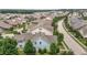 A residential street with two-story homes, lush greenery, and a sense of suburban tranquility at 1172 Pemberly Ave, Morrisville, NC 27560
