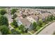 Two-story homes with various roof colors and green trees, create a diverse suburban neighborhood at 1172 Pemberly Ave, Morrisville, NC 27560
