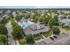 Community clubhouse and pool featuring lounge seating, slides, and adjacent parking for easy access at 1172 Pemberly Ave, Morrisville, NC 27560
