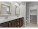 Bathroom with double vanity sinks and large mirrors at 1172 Pemberly Ave, Morrisville, NC 27560