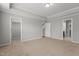 Large primary bedroom with walk-in closet and carpet flooring at 1172 Pemberly Ave, Morrisville, NC 27560
