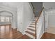 Staircase with hardwood floors and natural light flowing throughout at 1172 Pemberly Ave, Morrisville, NC 27560