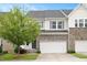 Charming two-story home with a stone facade and attached garage at 1416 Southpoint Trl, Durham, NC 27713