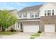 Charming two-story home with stone accents and a two-car garage at 1416 Southpoint Trl, Durham, NC 27713