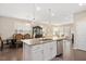 Open concept kitchen featuring an island with counter seating at 1416 Southpoint Trl, Durham, NC 27713