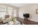 Bright living room with a door to the outside and lots of natural light at 1416 Southpoint Trl, Durham, NC 27713