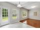 Bright dining area with door to backyard and view into living room at 160 Chandler Springs Dr, Holly Springs, NC 27540