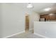 Open concept kitchen, view into walk in pantry and dining area at 160 Chandler Springs Dr, Holly Springs, NC 27540