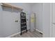 Functional utility room equipped with shelves, a water heater, and a ladder at 161 Bridgewater Dr, Erwin, NC 28339