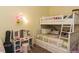 Bedroom featuring a bunk bed, vanity, and ample storage for children at 1911 Kudrow Ln, Morrisville, NC 27560