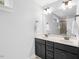 Bathroom featuring double sinks and a large vanity mirror at 1920 Hart St, Durham, NC 27703