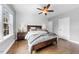 Comfortable bedroom featuring hardwood floors and recessed lighting at 1920 Hart St, Durham, NC 27703
