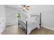 Bright bedroom featuring a large window and neutral decor at 1920 Hart St, Durham, NC 27703
