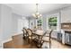 Bright dining room featuring hardwood floors and natural lighting at 1920 Hart St, Durham, NC 27703