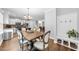 Open dining area with stylish furnishings and hardwood floors at 1920 Hart St, Durham, NC 27703