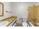Cozy bathroom, featuring a shower, toilet and vanity ready for renovation at 204 Chatterson Dr, Raleigh, NC 27615