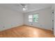 Bedroom featuring a ceiling fan, a window, and hardwood floors at 204 Chatterson Dr, Raleigh, NC 27615