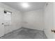 Bright bedroom with cozy carpet, window, and a door to enter the house at 204 Chatterson Dr, Raleigh, NC 27615