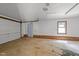 Spacious garage with door to enter the house, window, and lots of space for parking at 204 Chatterson Dr, Raleigh, NC 27615