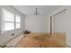 Spacious living room featuring bright windows and chandelier, perfect for entertaining at 204 Chatterson Dr, Raleigh, NC 27615