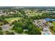 Aerial view of a home near baseball fields and tennis courts at 212 Plum St, Burlington, NC 27215