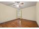 Bright bedroom with hardwood floors, window views, and ample space for furnishings at 212 Plum St, Burlington, NC 27215