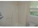 Bathroom featuring a shower/tub combo, a toilet, and a window at 221 Hickory Glen Ln, Durham, NC 27703