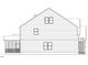 Side view showing enclosed porch, windows, and stone detail at 257 Murray Grey Ln, Wake Forest, NC 27587