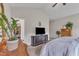 Bedroom features a vaulted ceiling and a flat screen TV on a cabinet at 272 W Gennessee Dr, Zebulon, NC 27597